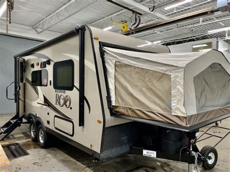 Hybrid campers for sale near me - 55 AMP Converter with Charger. Ceiling LED 12V Interior Lighting. Fireplace (235S Only) Quick Recovery Water Heater w/ Interior Gas/Electric Switches. Bunk Fan/Light Combo w/ Each Bed. Two Maxxair Ventilation Fans & Covers. Heated Mattress. 35K BTU Ducted Furnace. 15,000 BTU Ducted Air Conditioner. 